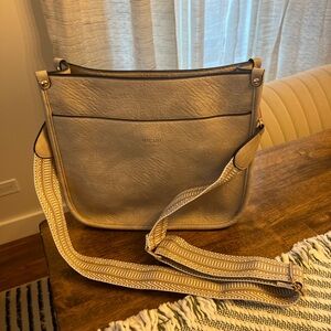 Beige pleather crossbody bag, with small cosmetic bag and second strap